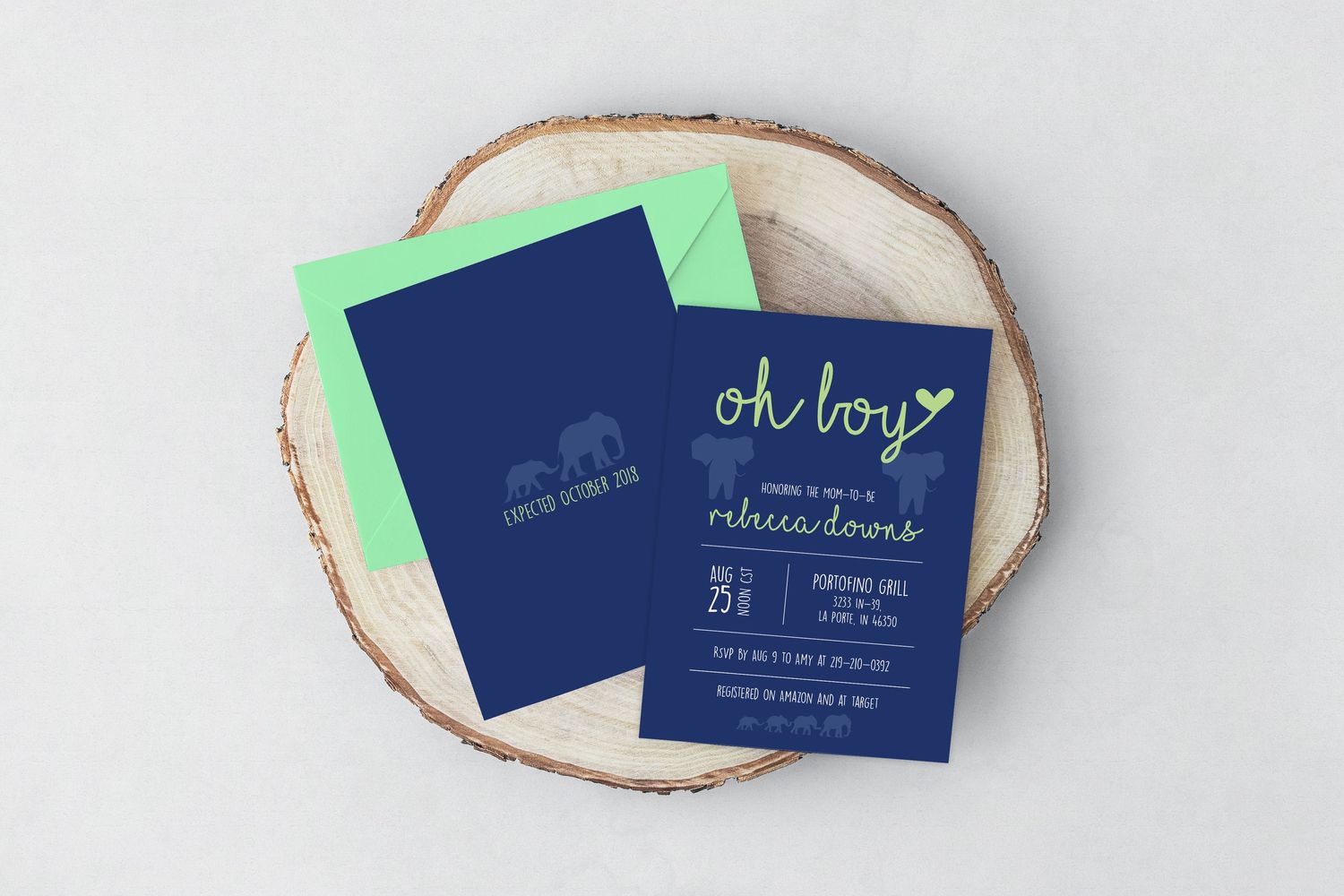 blue and lime green baby shower invitation featuring elephants