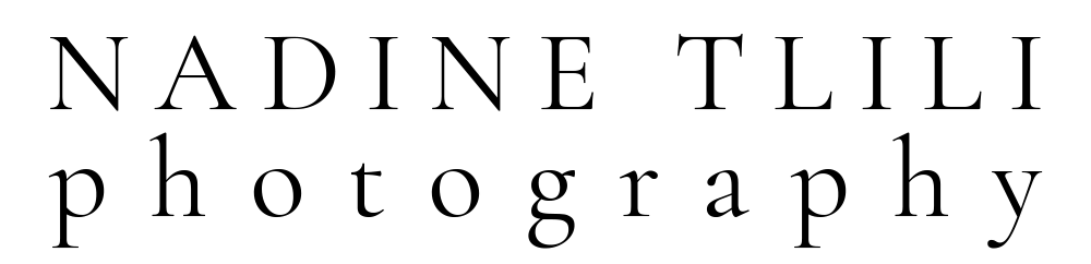 Solid black rectangular element or shape against a dark background.