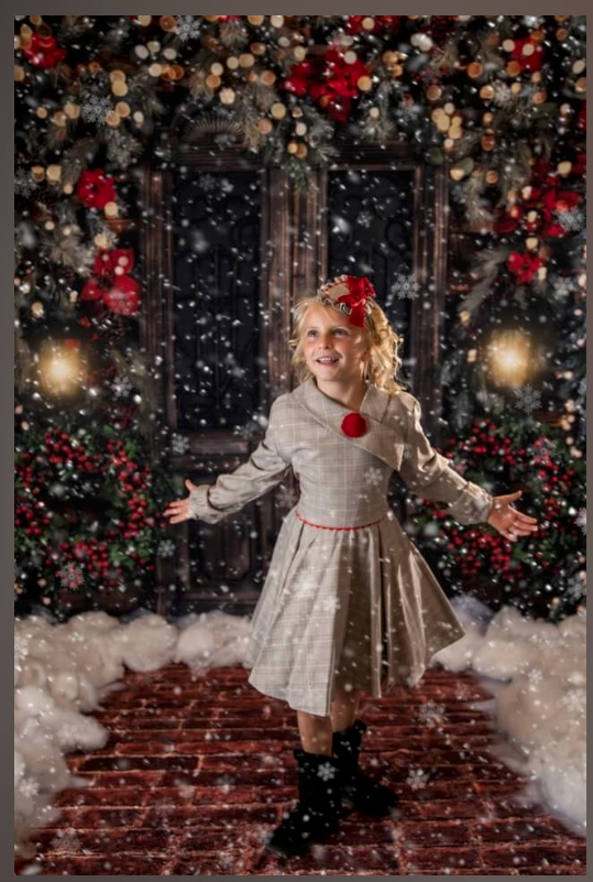 Magical Christmas photo backdrop with falling snow, red ornaments and glowing lanterns.