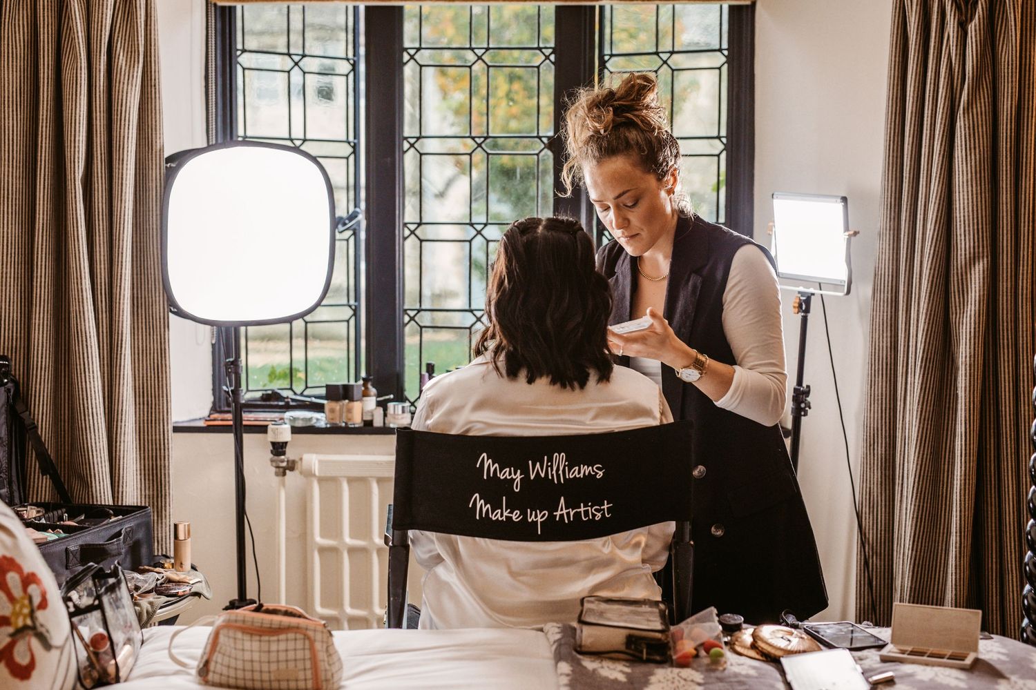 Professional styling session in progress with bright lighting and equipment.