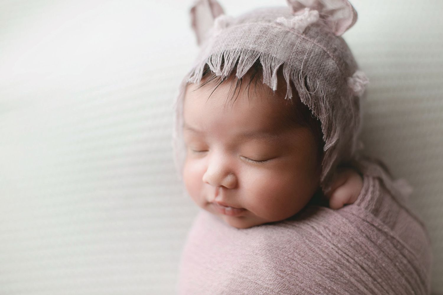Baby, I'm in a purple wrap and hat. Greenville sc newborn photographer, Easley sc newborn photographer, Upstate sc newborn photographer