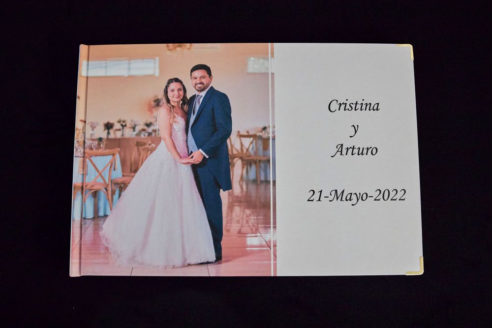 Wedding album cover featuring formal portrait and text with date May 21, 2022.