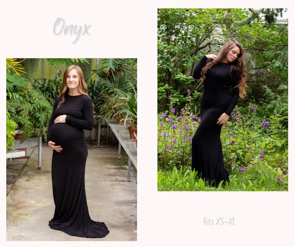Black maternity gown with long sleeves photographed against natural garden backdrop.