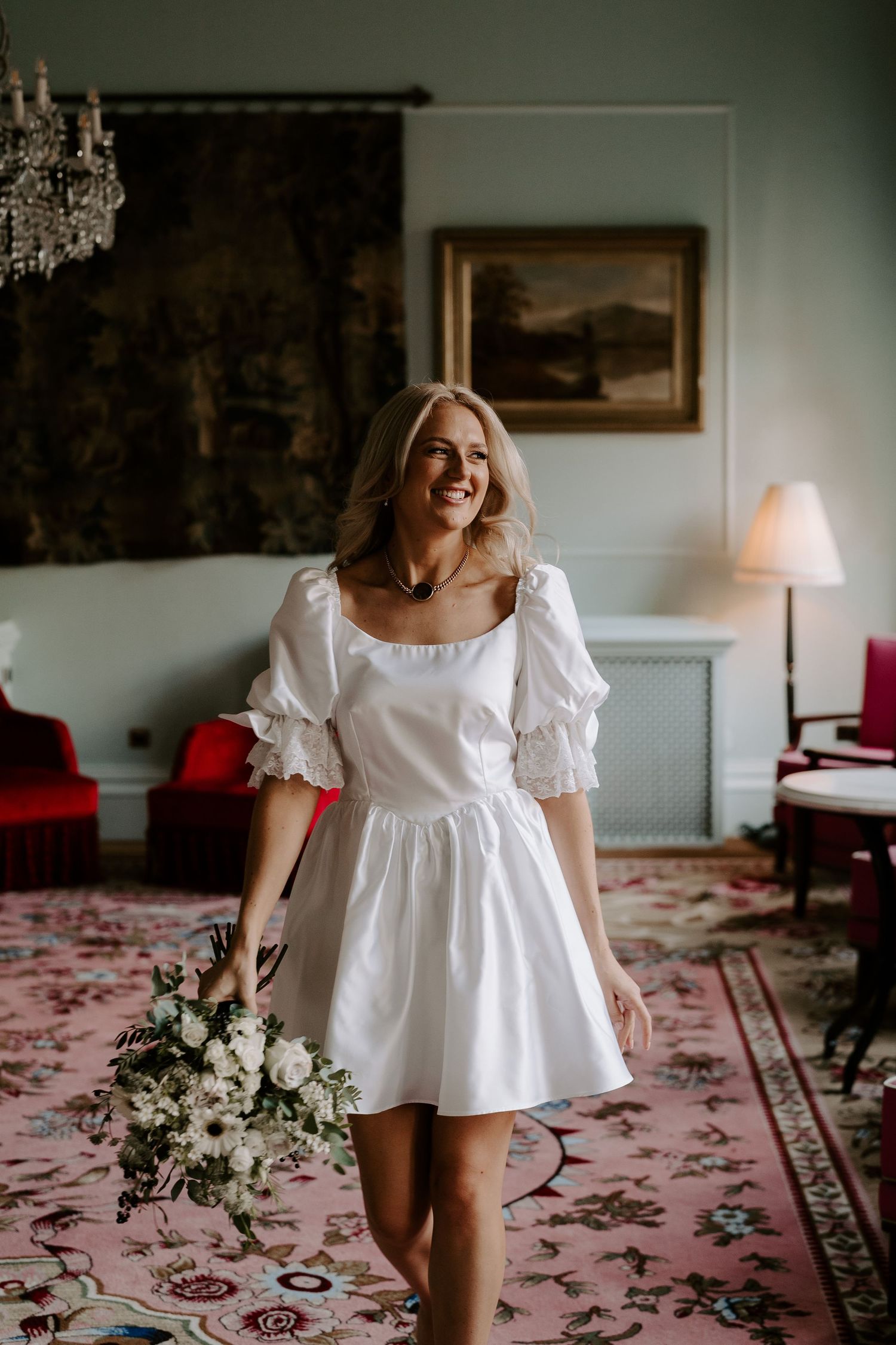 bride walking smiling at the Randolph hotel in oxford