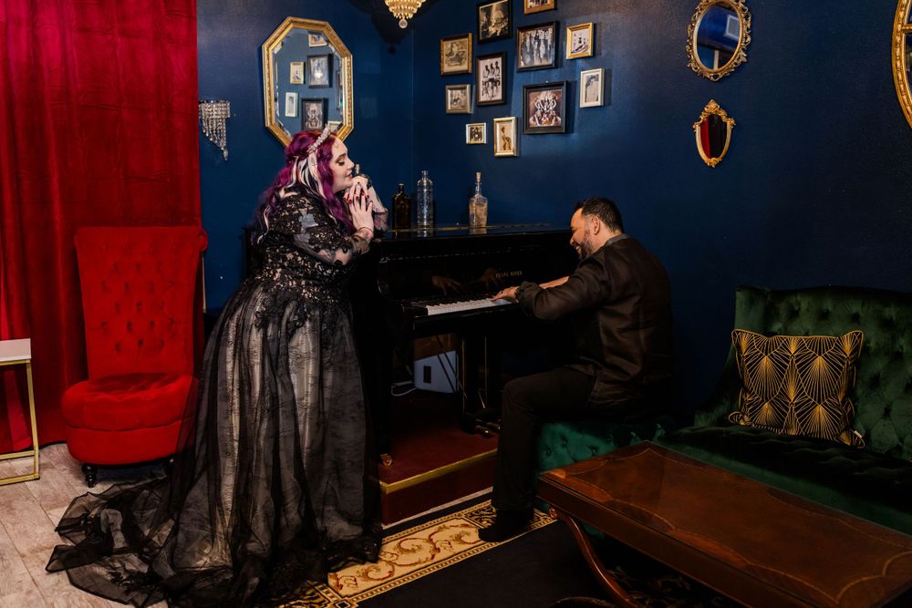 man serenading woman with grand piano