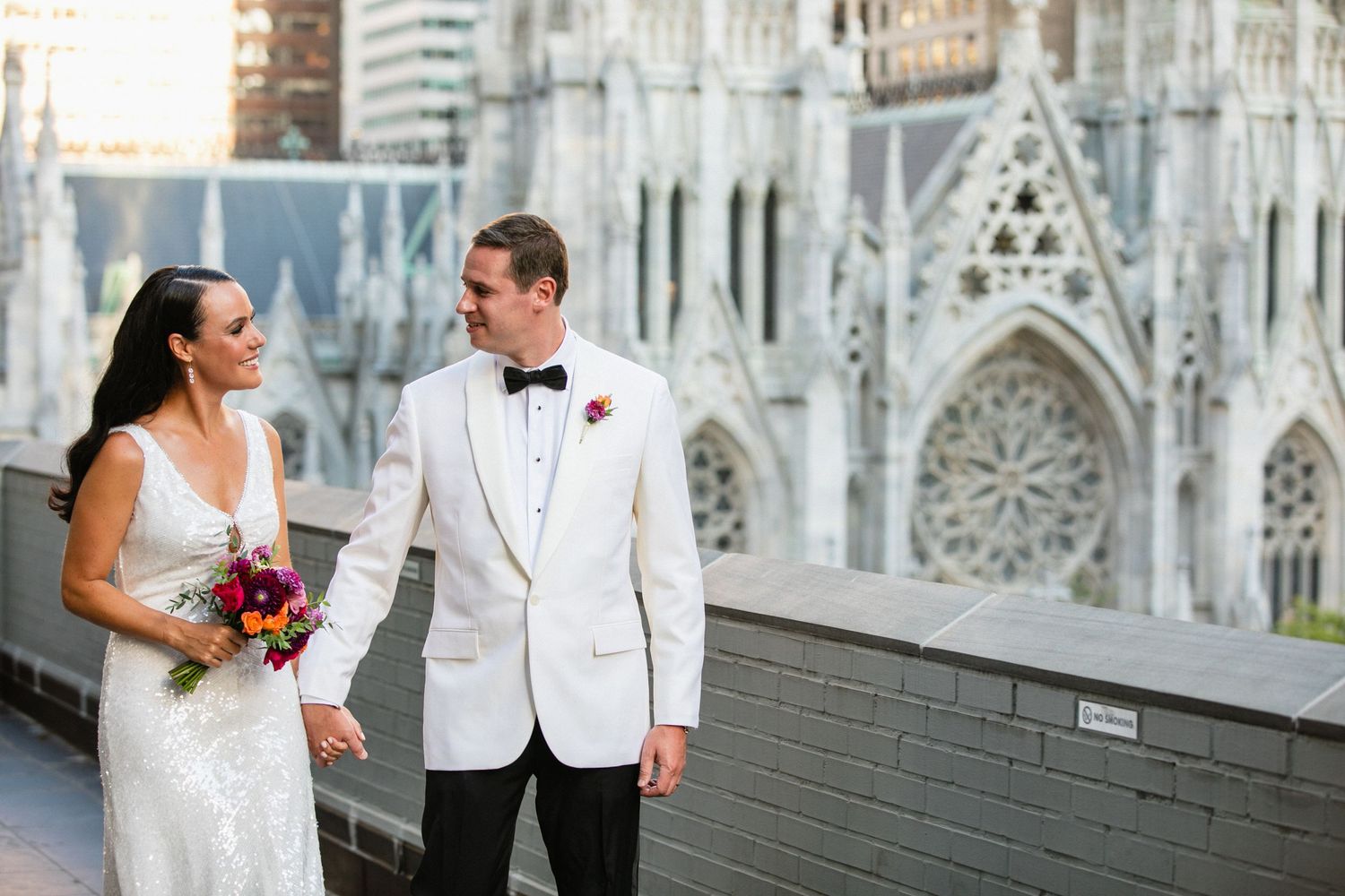 A bride and groom overlooking St Patricks Cathedral