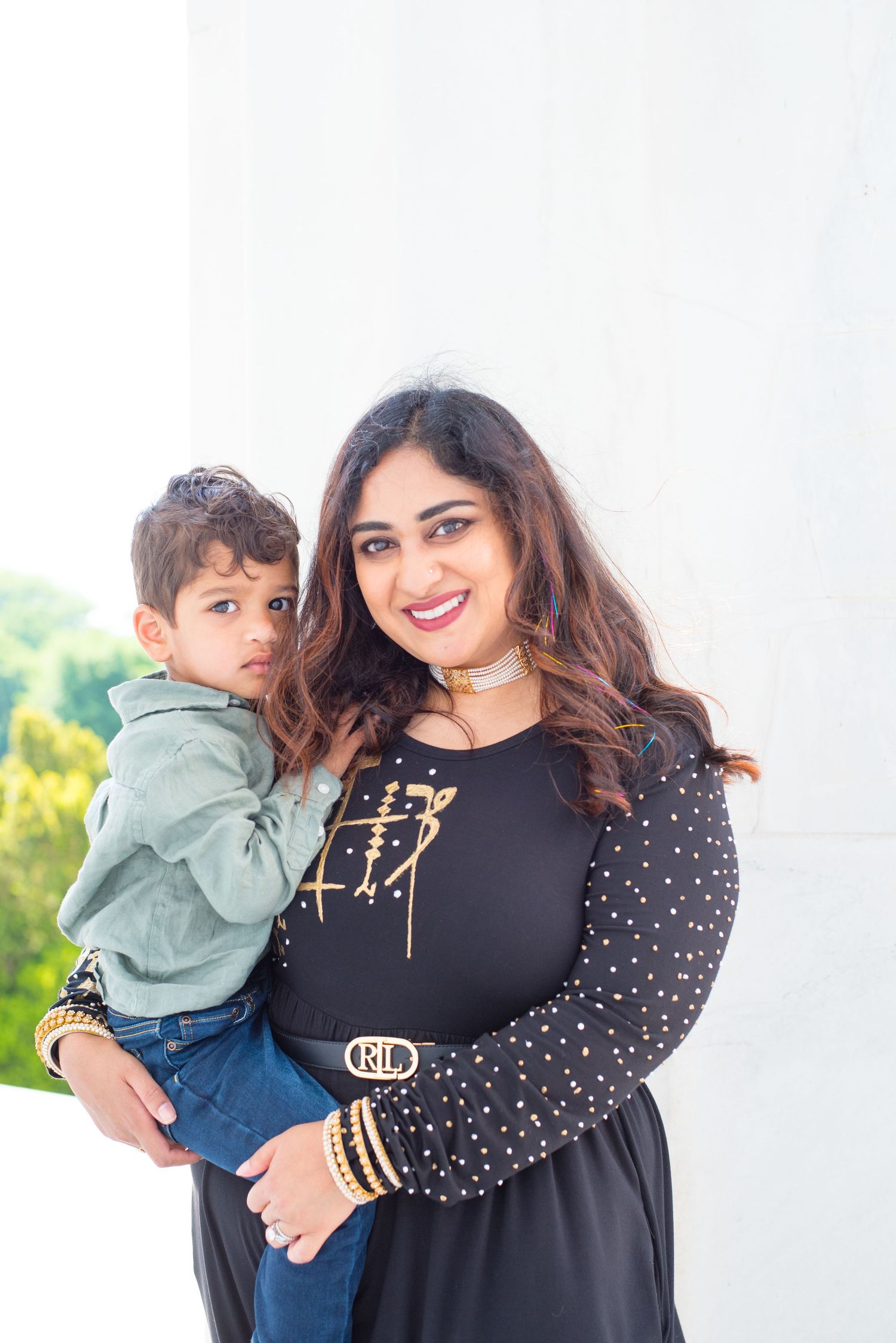 square image of mom holding her son