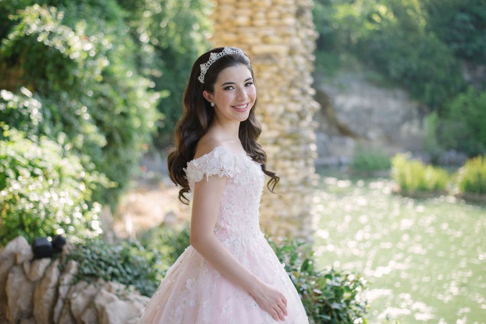 girl smiling. pink dress. formal photo shoot. japanese garden. San Antonio, Texas. wedding photographer