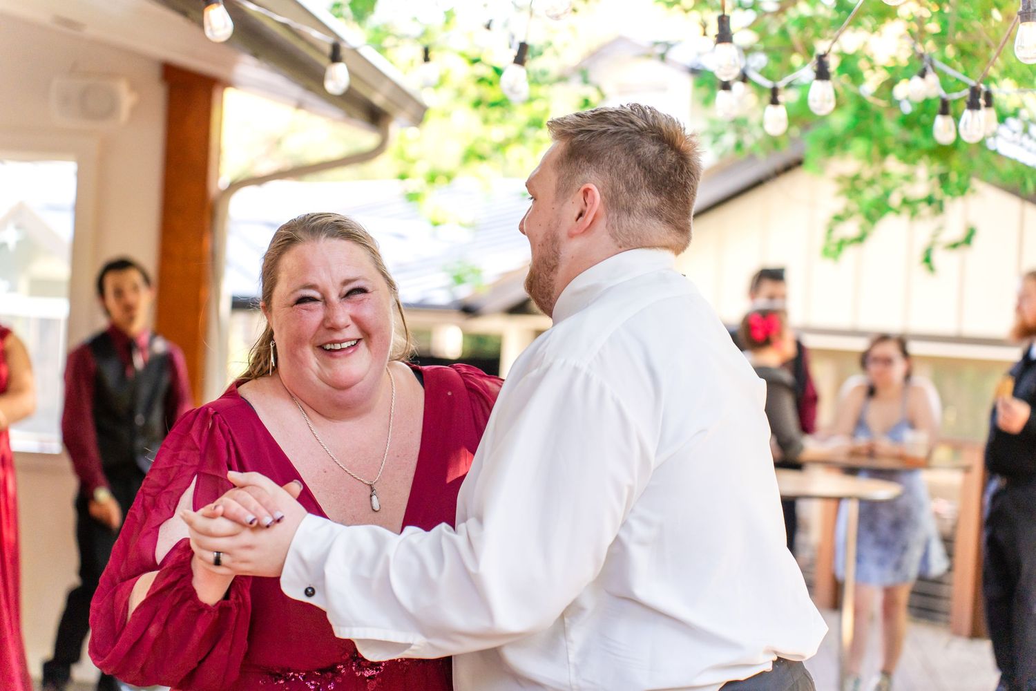 mother of the groom dances with the groom