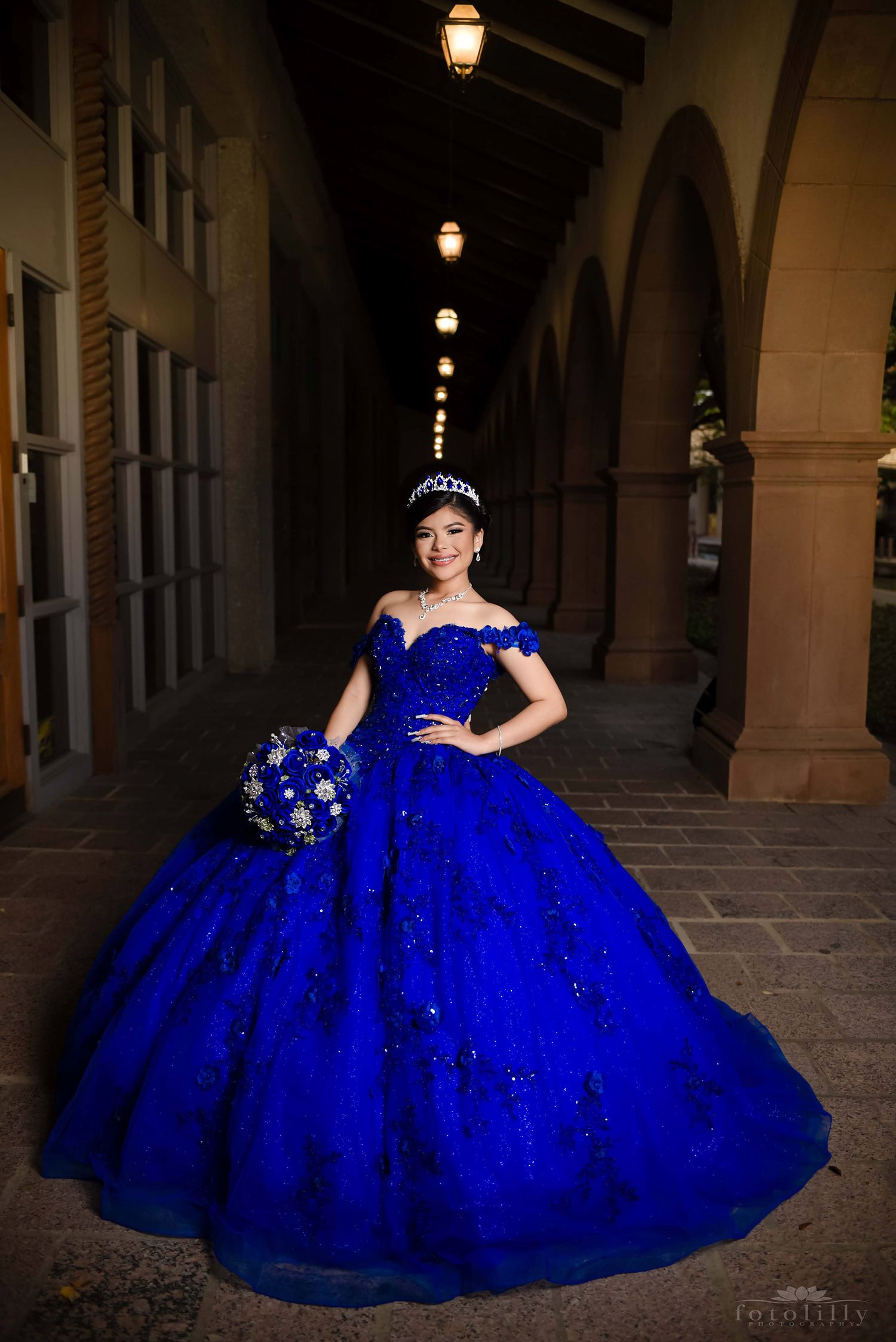 Emma quinceañera photoshoot in Dallas Fort Worth wearing a blue quince dress photographed by Fotolilly Photography