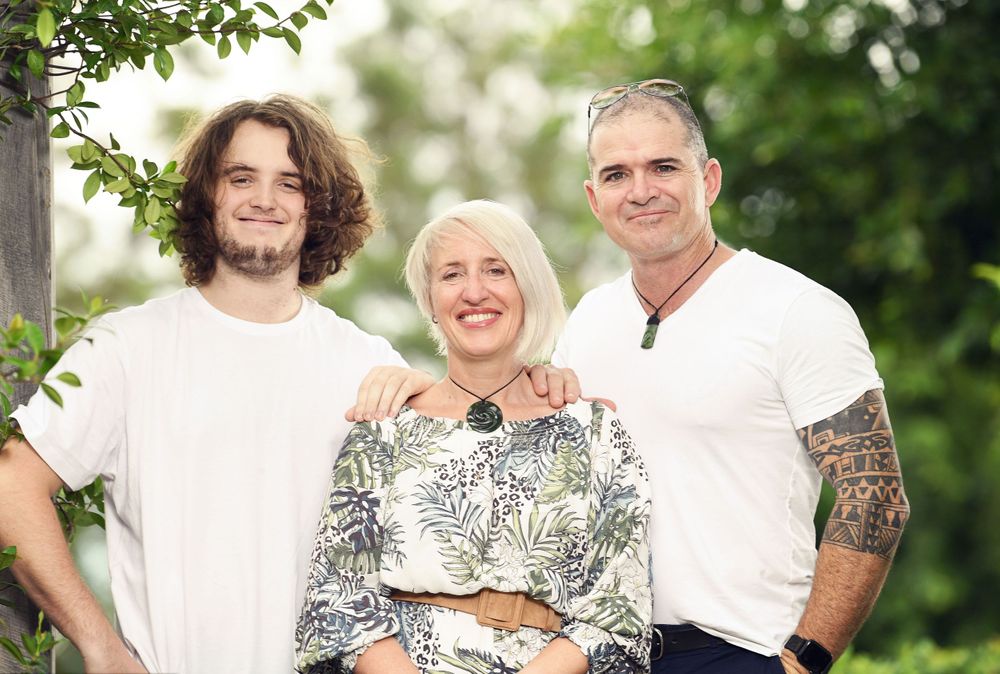 Mum with husband and adult son at the park
