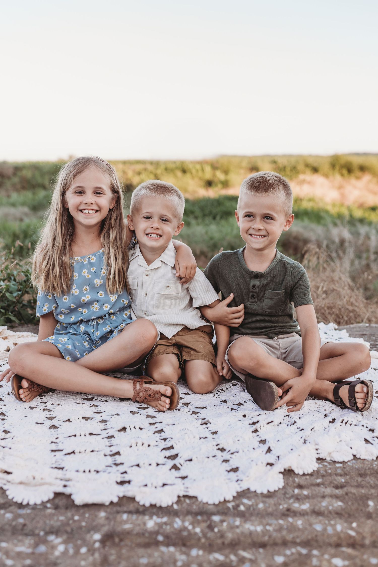 Kids sit and smile for their photographer near Lancaster Pennsylvania