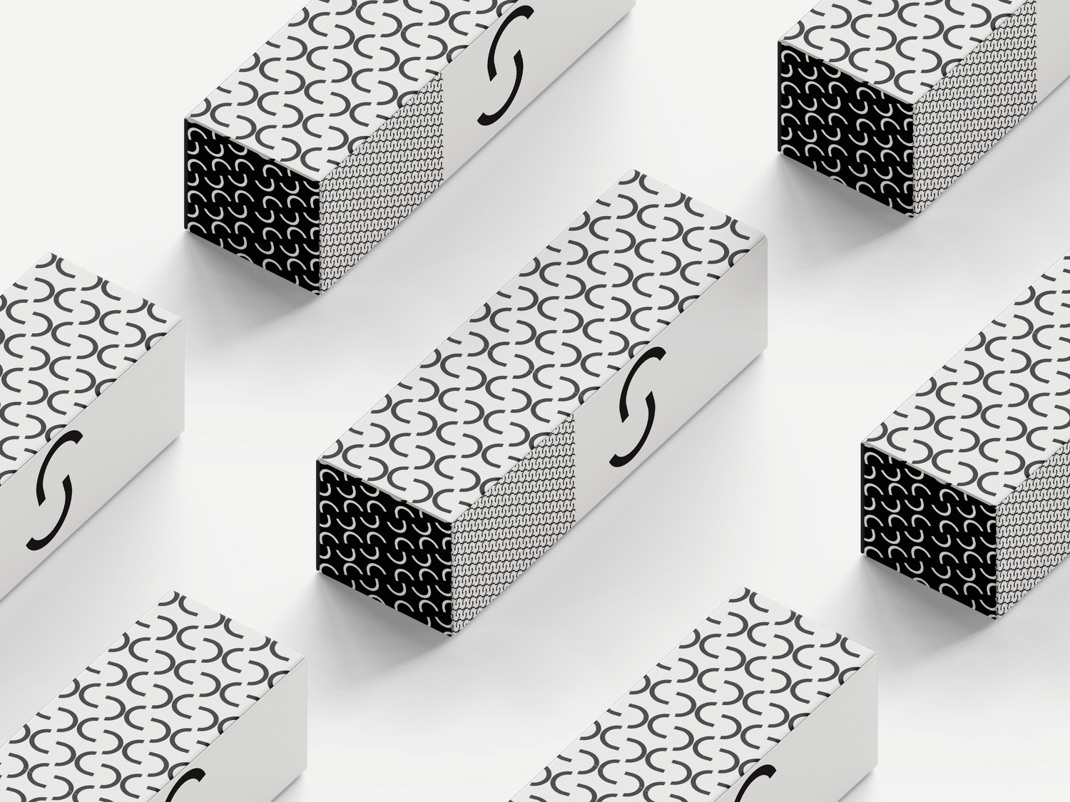 Geometric pattern design featuring black and white honeycomb shapes in a repeating layout.
