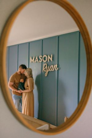 Series of reflection shots in round mirror showing tender family moments.