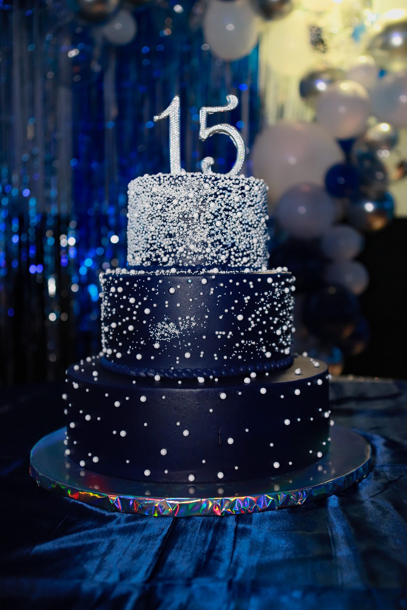 Midnight and white Quinceanera cake