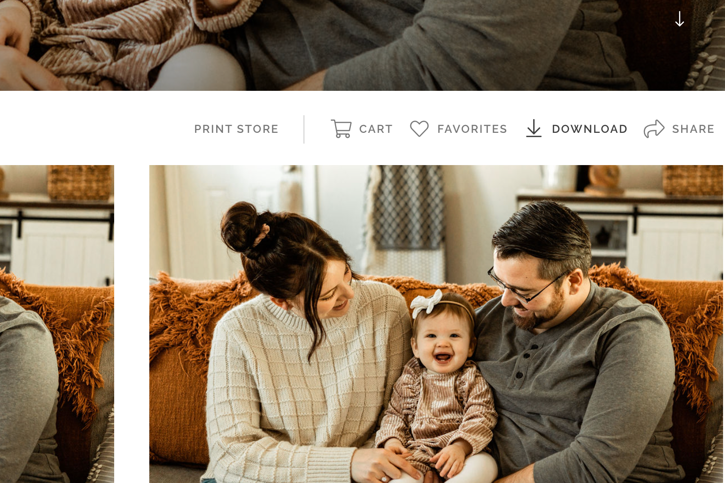 Family enjoying cozy moment together on brown sofa at home.