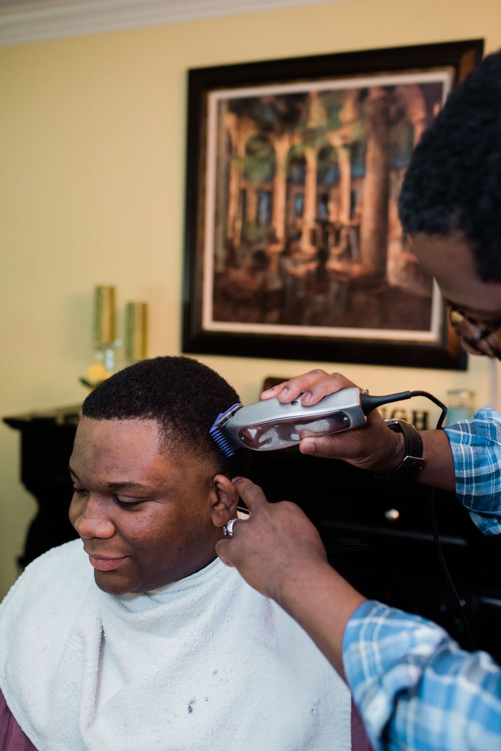 groom getting a haircut