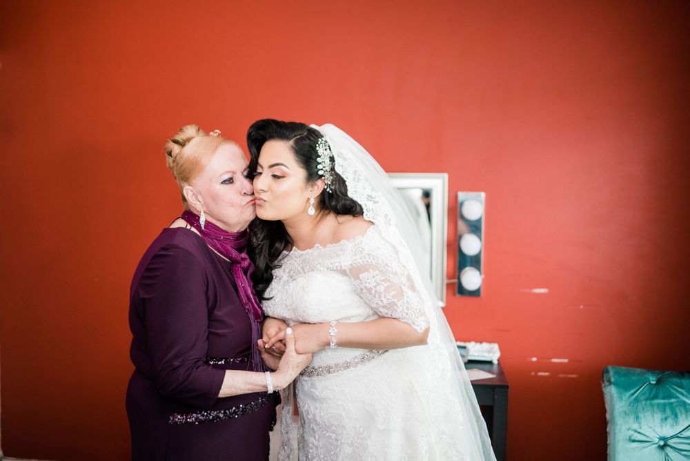 bride kissing grandmother