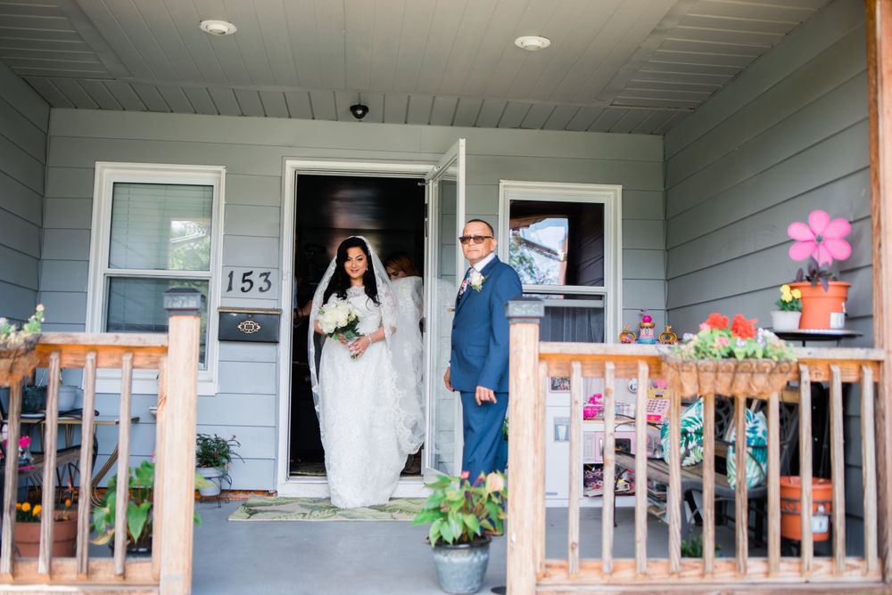 bride walking out of childhood home