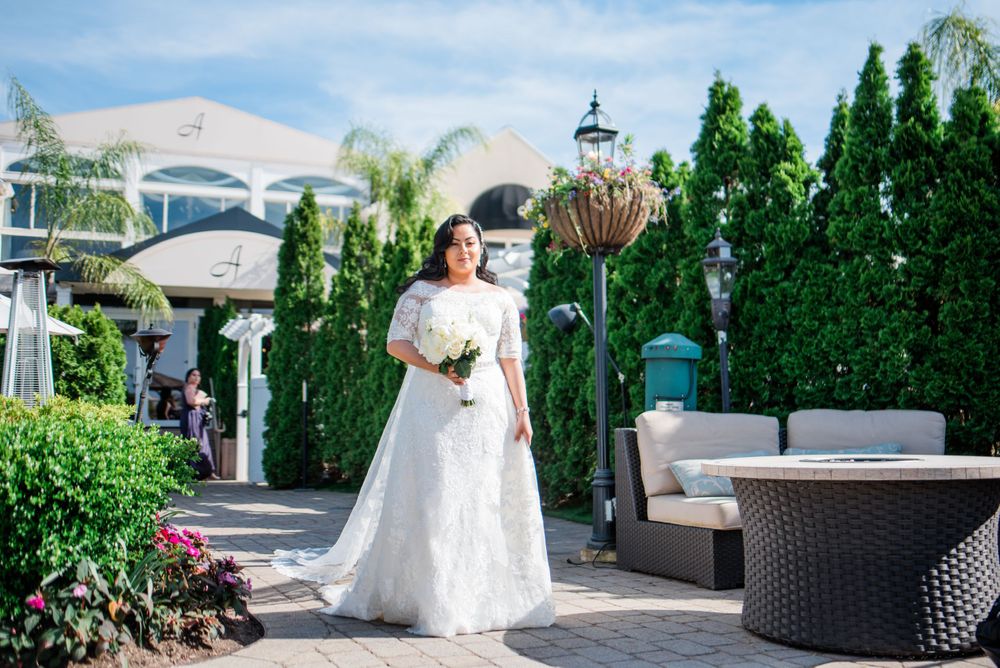 bride walking toward groom for the first look