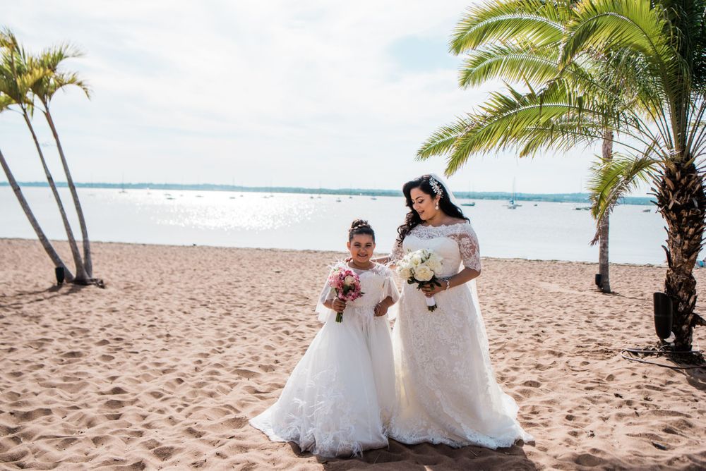 bride and junior bride on beach