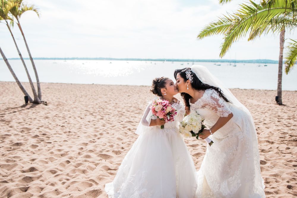 bride kissing junior bride