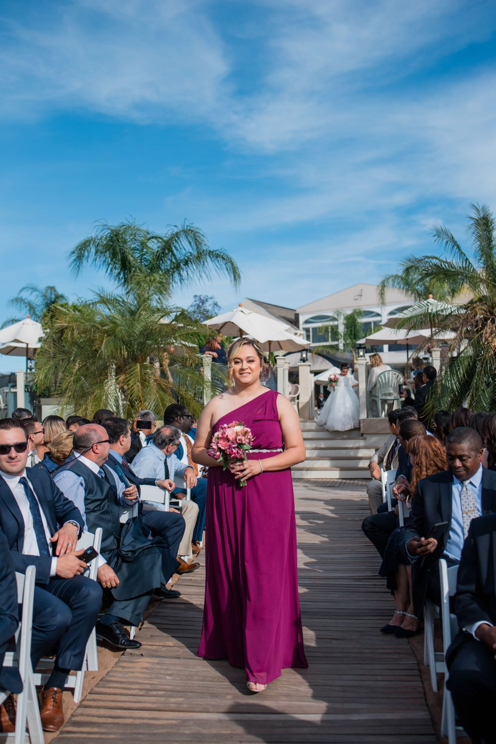 maid of honor walking down the aisle