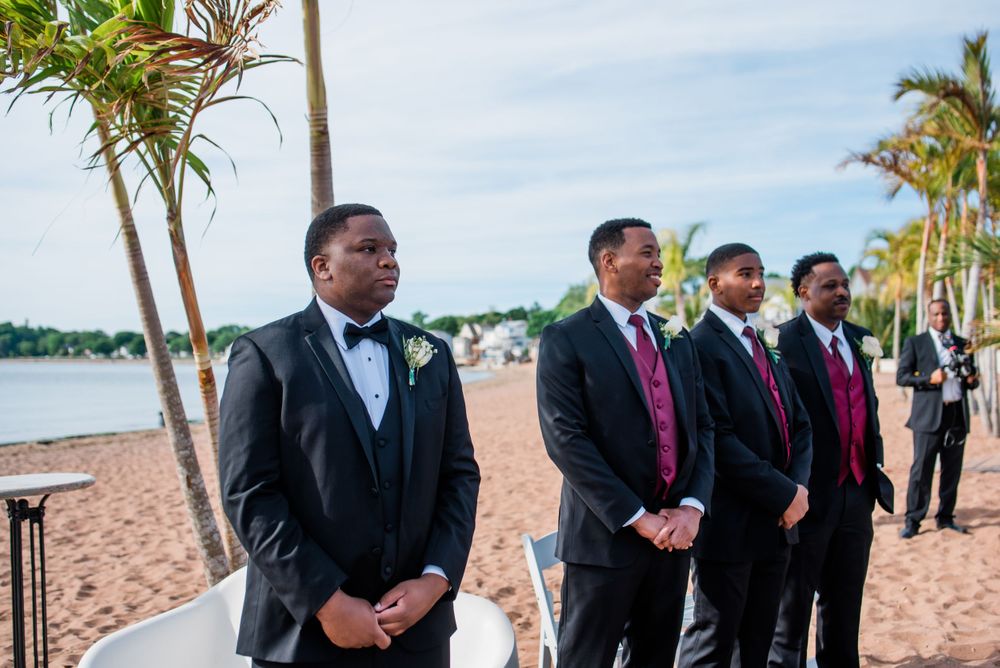 groom and groomsmen waiting for bride