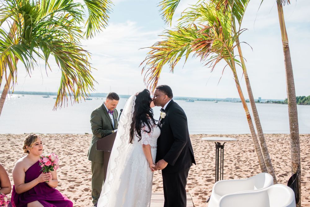 groom and bride kissing