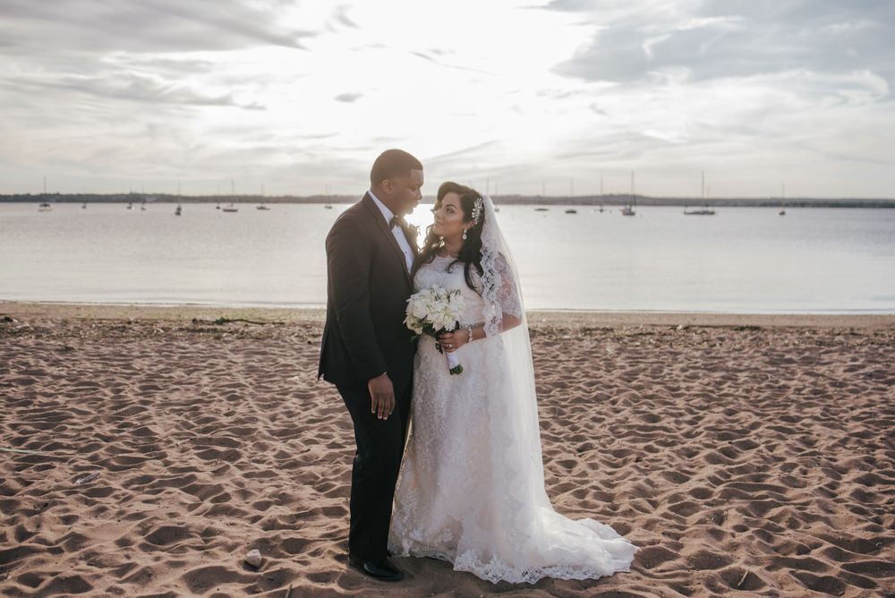 bride and groom portrait at the beach