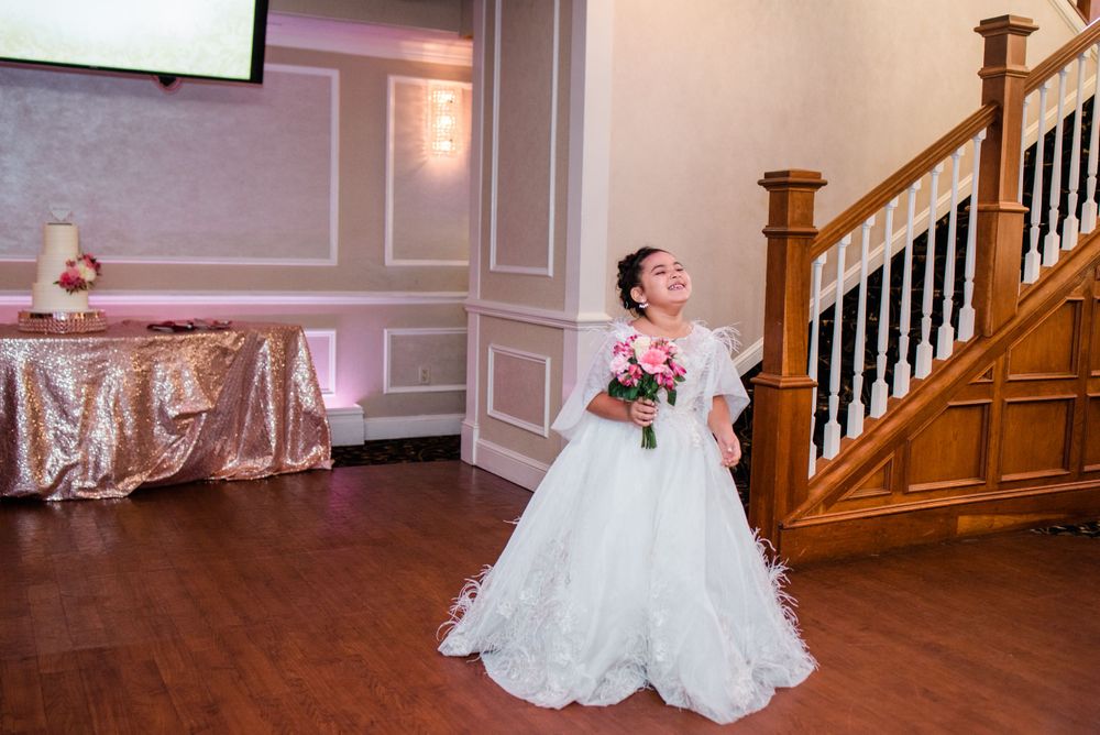 junior bride walking in reception