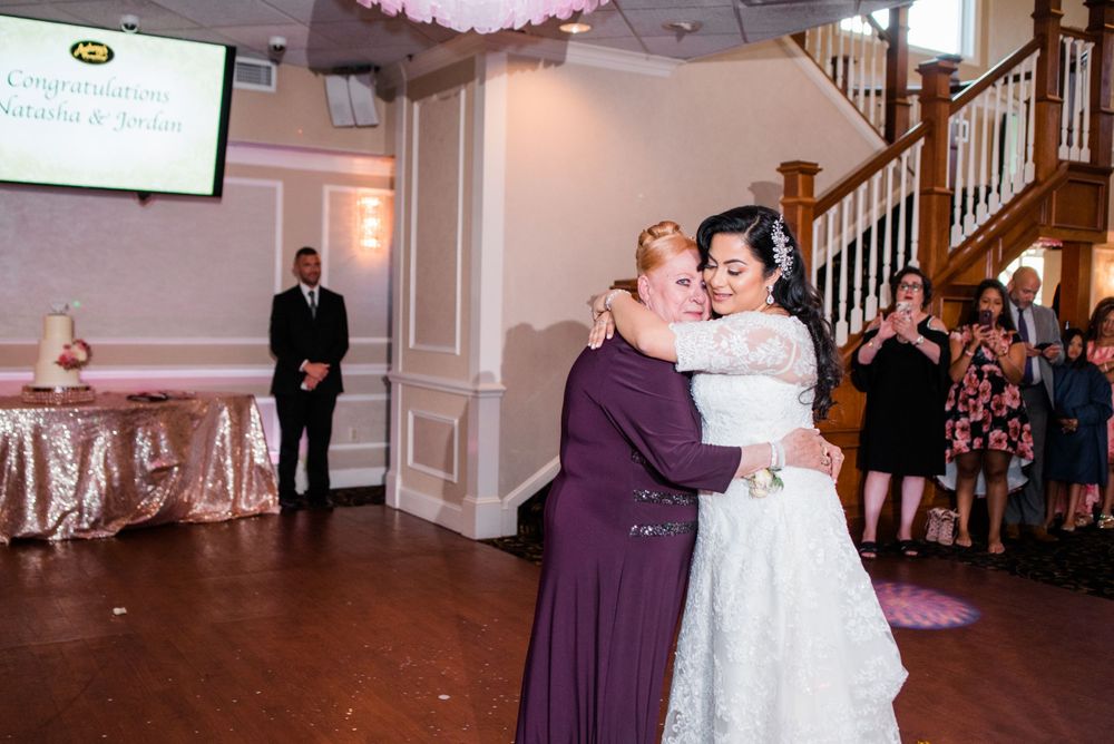 bride and grandmother dance