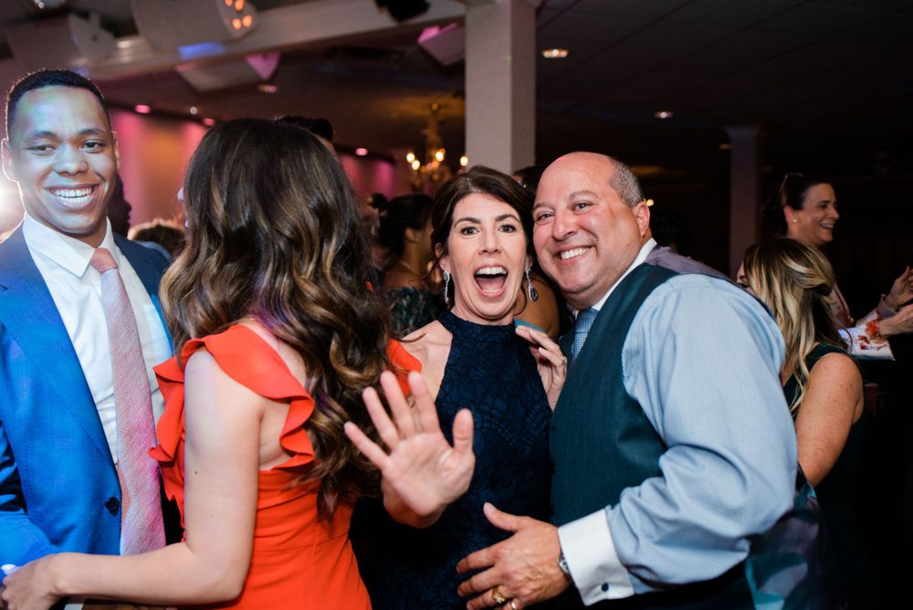 guest at reception dancing