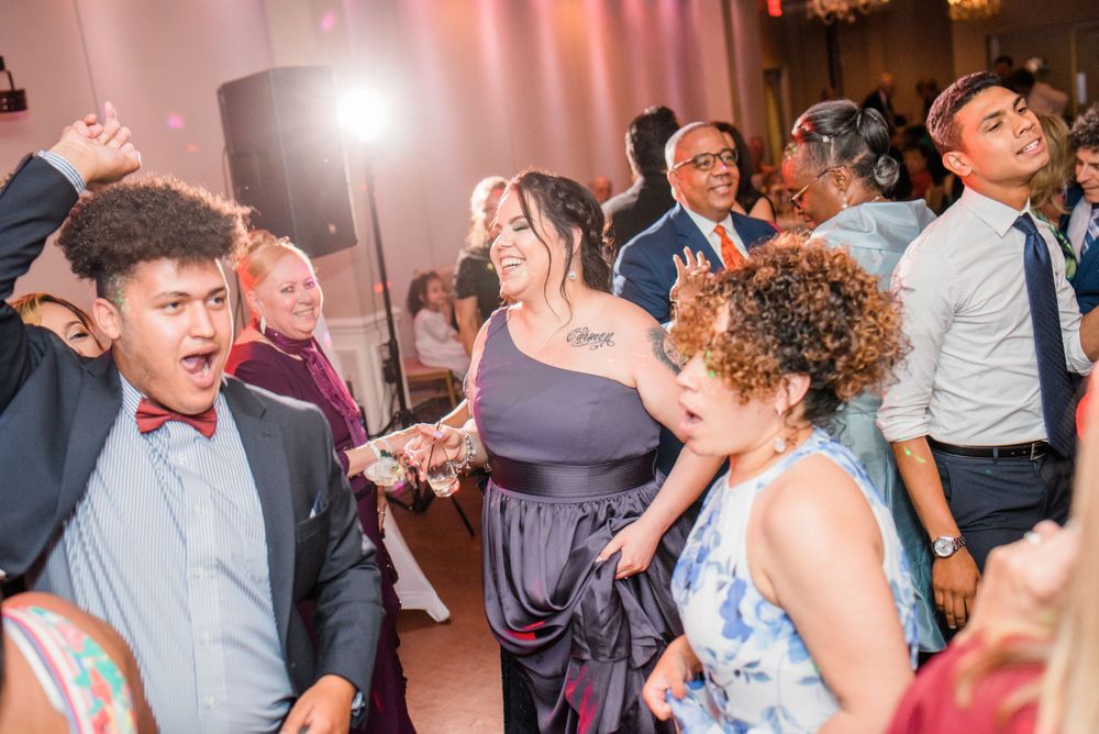 wedding guest dancing at reception
