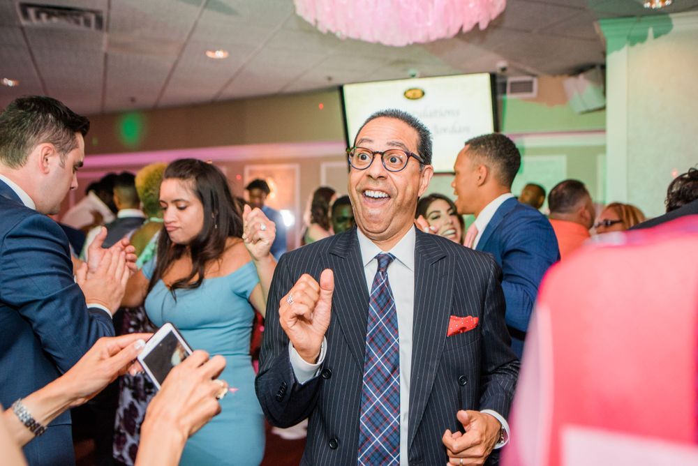 wedding guest dancing at reception