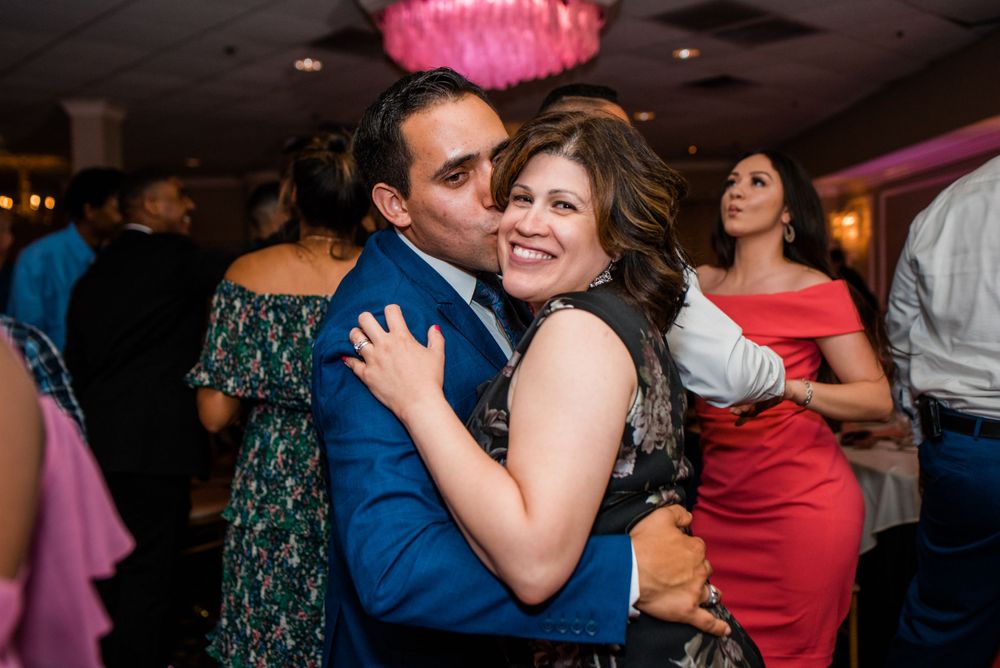wedding guest couple dancing at reception