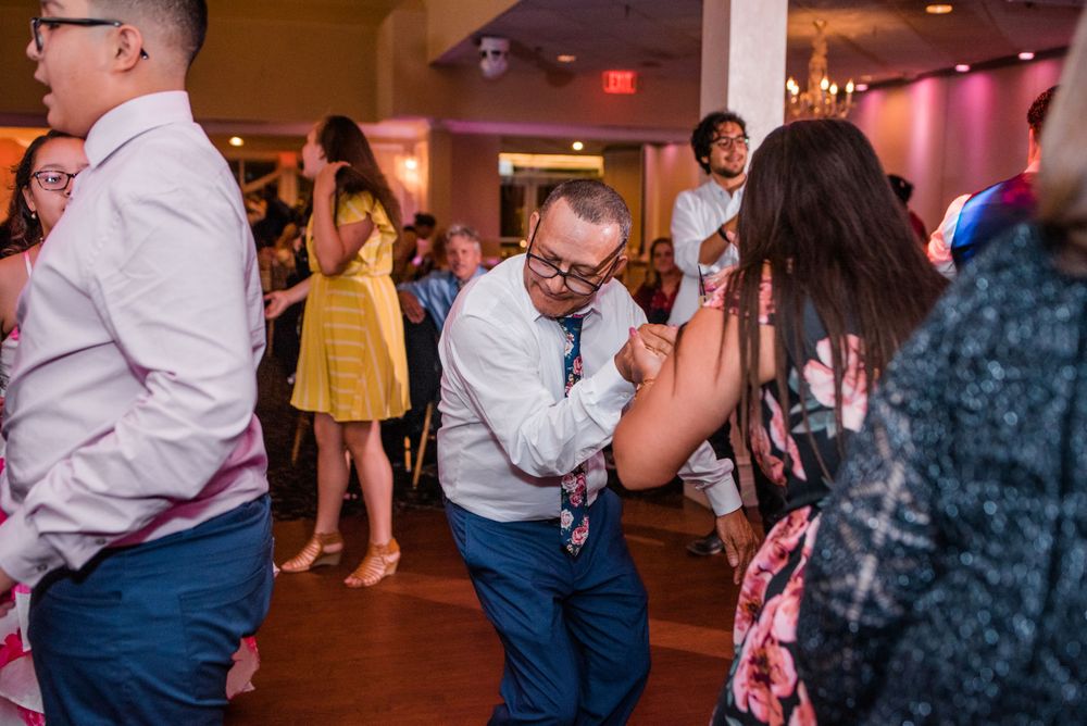 wedding guest dancing at reception