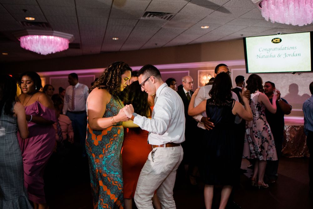 wedding guest dancing at reception