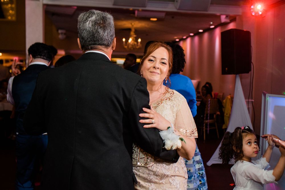 wedding guest dancing at reception