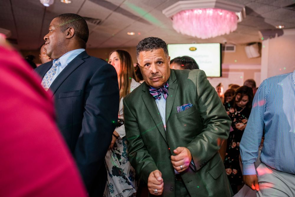 wedding guest dancing at reception