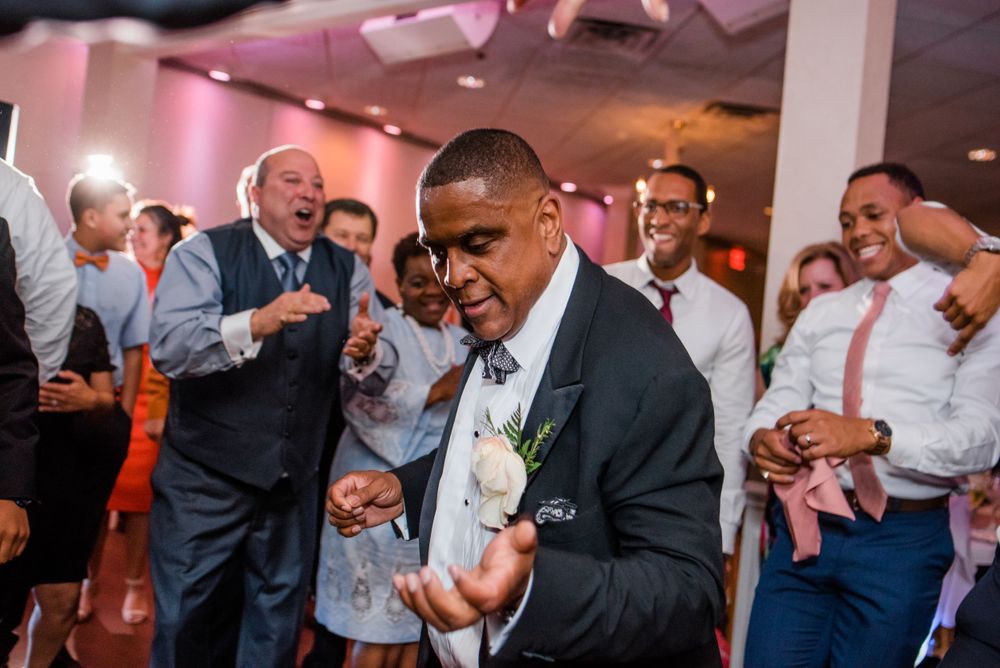 wedding guest dancing at reception