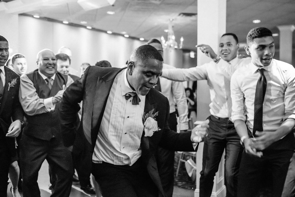 wedding guest dancing at reception