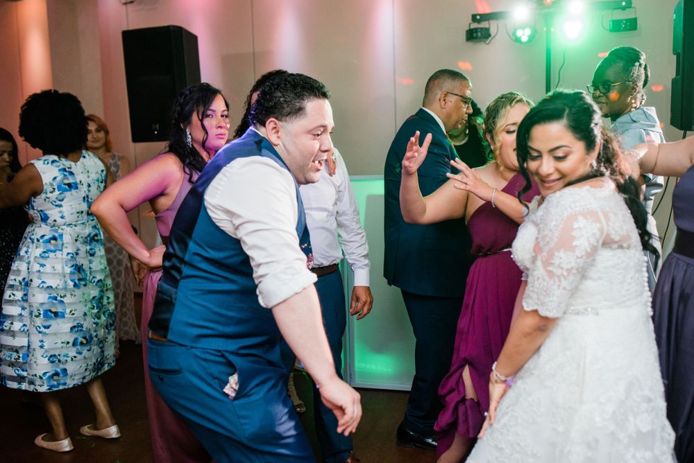 wedding guest dancing at reception