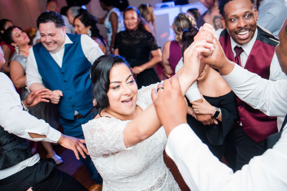 wedding guest dancing at reception