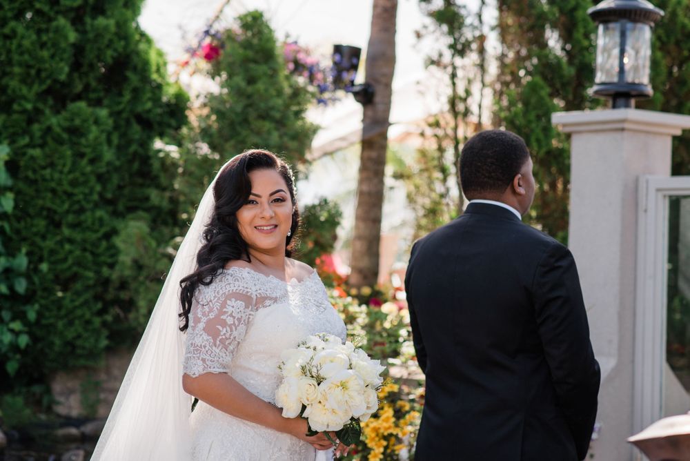bride smiles before seeing groom