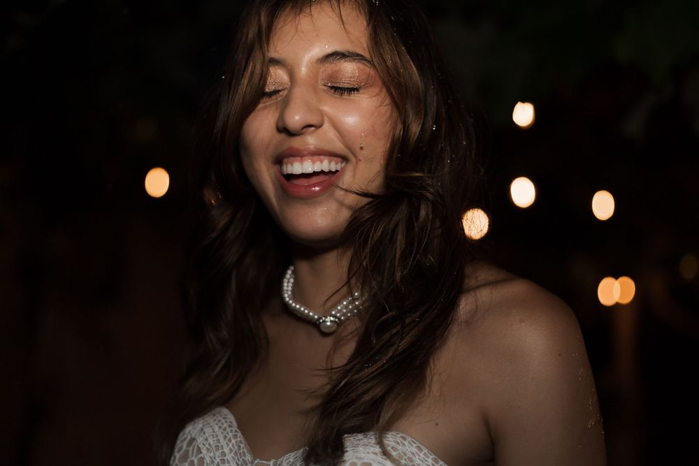 bride laughing of joy in the night