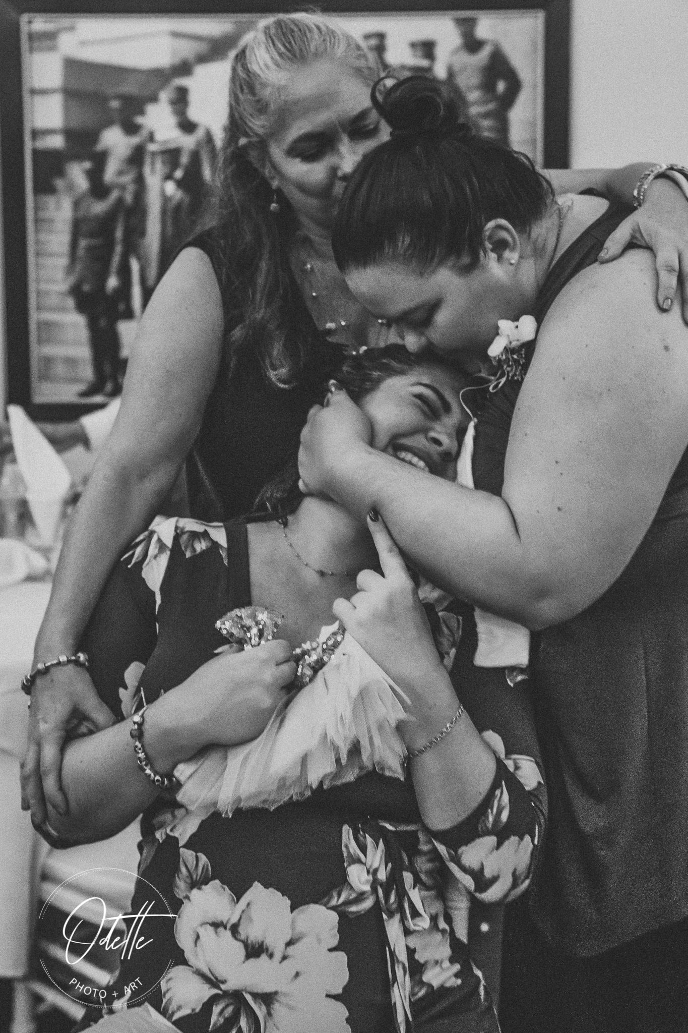 emotional image where one sister is the surrogate mom for her sister's daughter