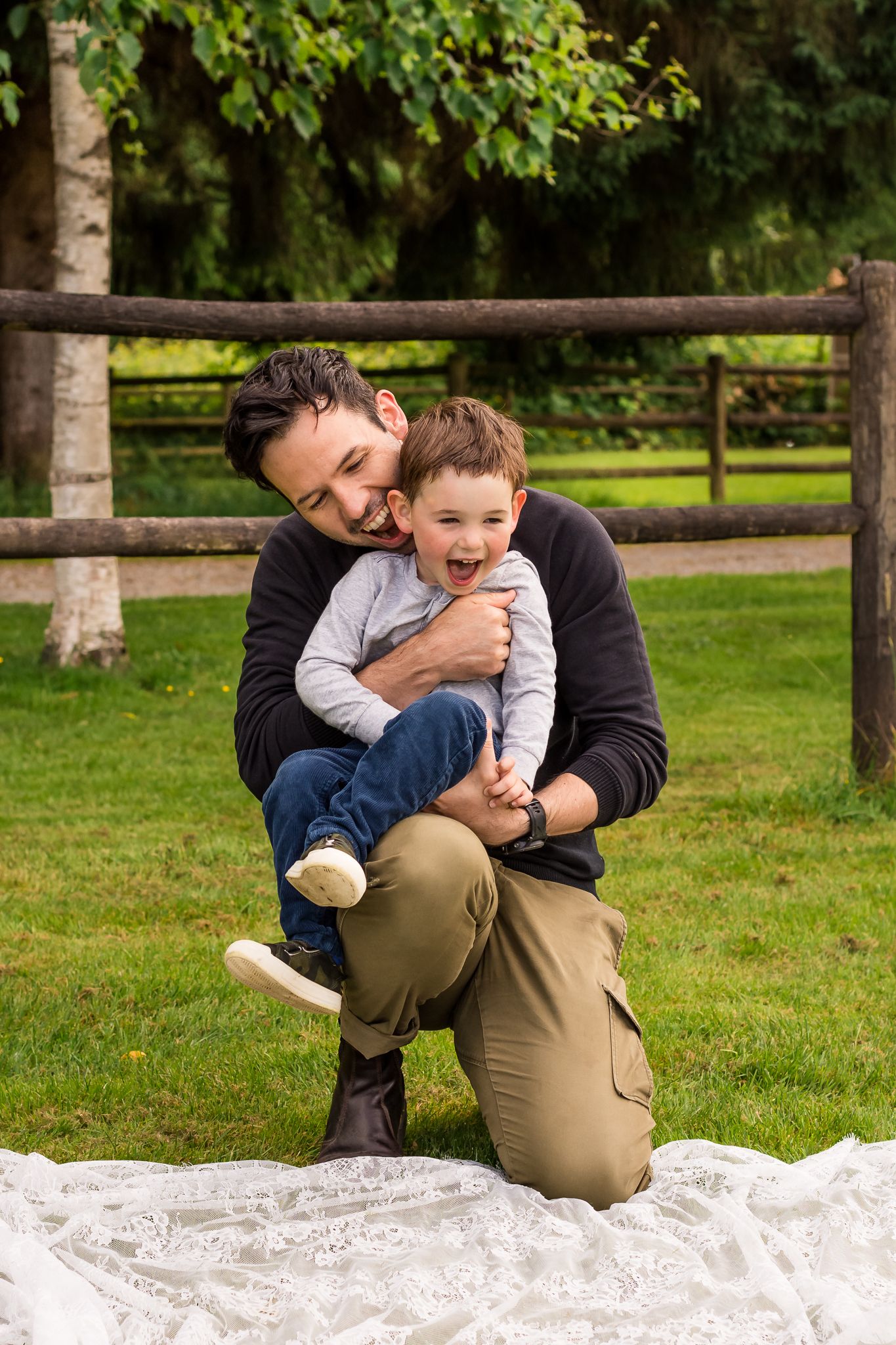 Dad and toddler smiling, dad and son family photos, summer photo session