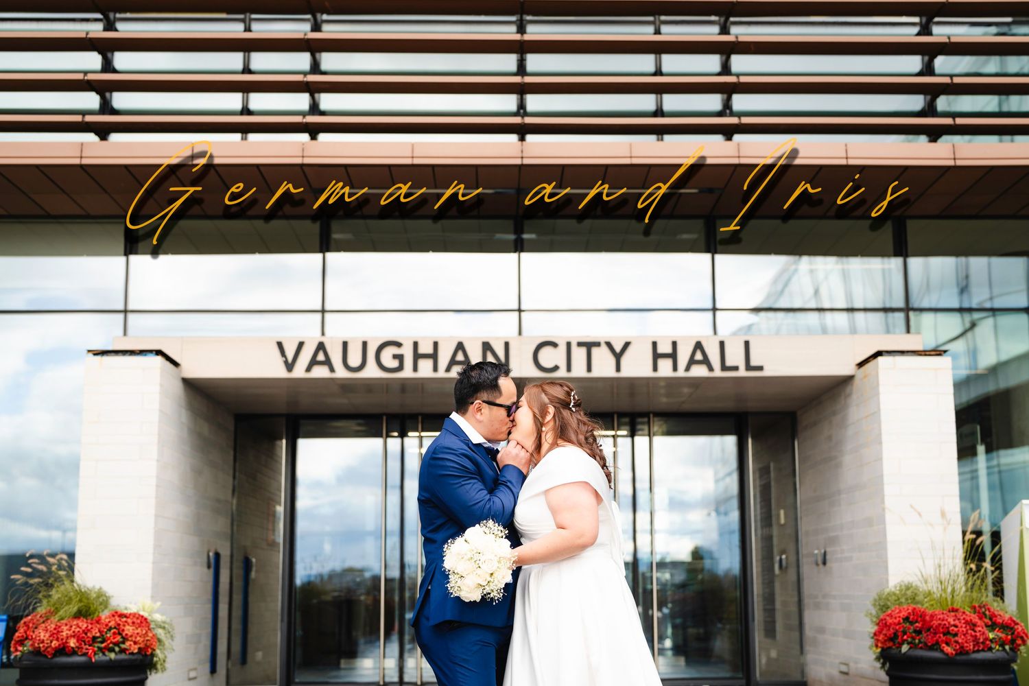 Groom and Bride kissing in front of Vaughan City Hall