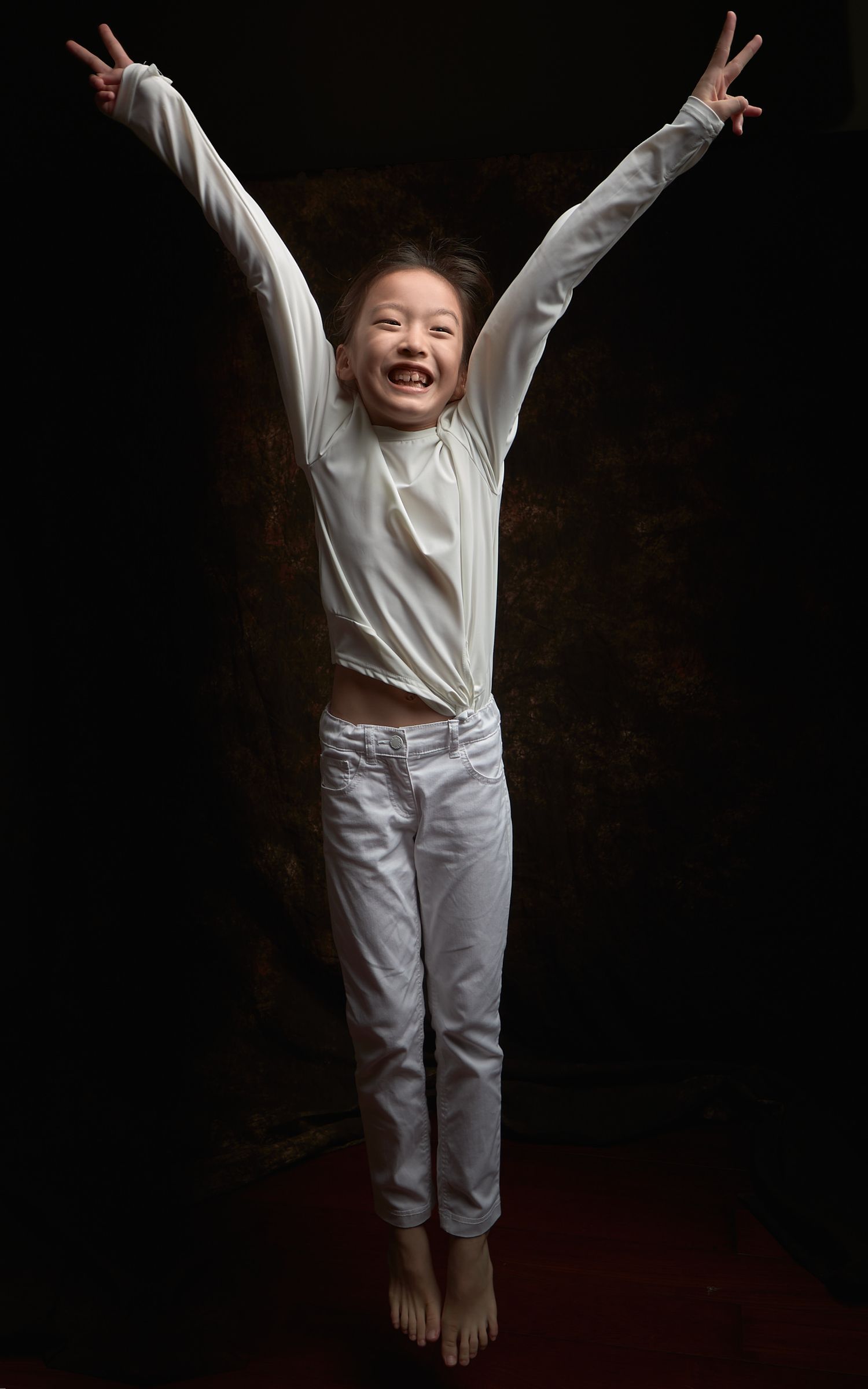 Hester Chinese girl birthday photos hyperactive kid fun collaborative game jumping up